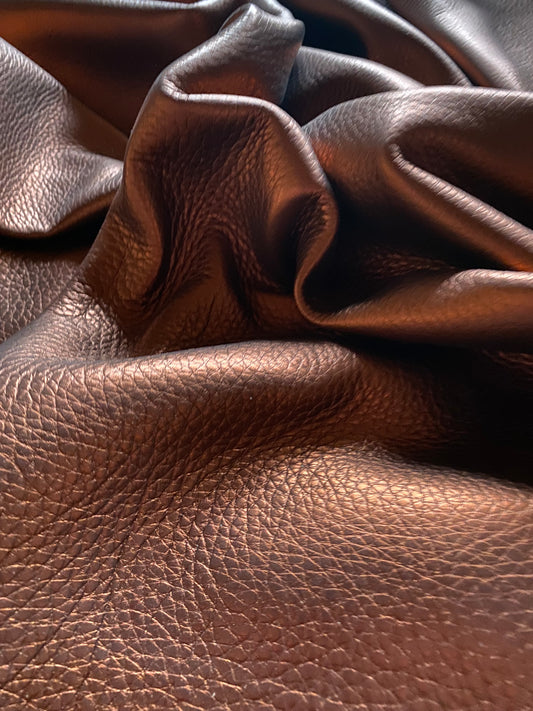 Calf nappa copper metallic 1.4-1.6 mm. Width 70-80 cm. Centimeter goods.