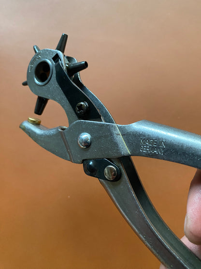 Revolver hole pliers with hole size viewing window