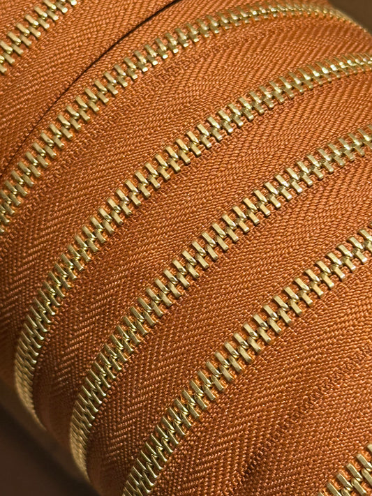 YKK Excella® Cognac 079-Gold. Größe 5 (5mm). Meterware. 1-Way