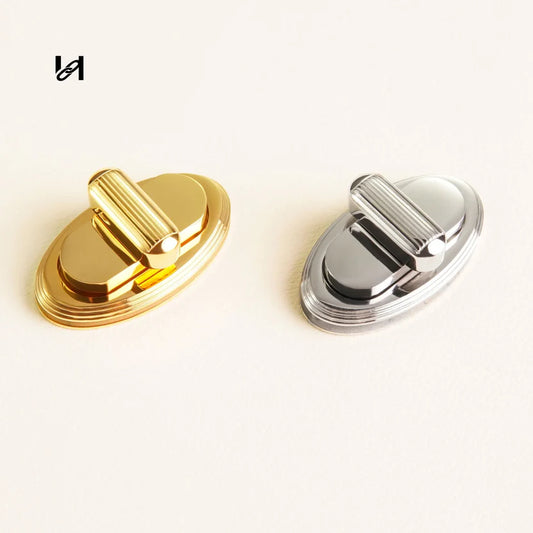 Cierres giratorios ovalados de acero inoxidable 38×21 mm Hility Baghardware – Herrajes personalizados para bolsos y marcas
